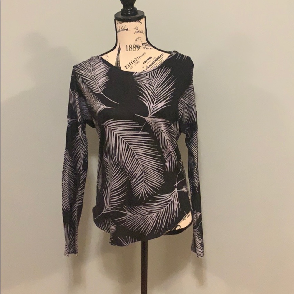 Black feather long sleeve shirt.